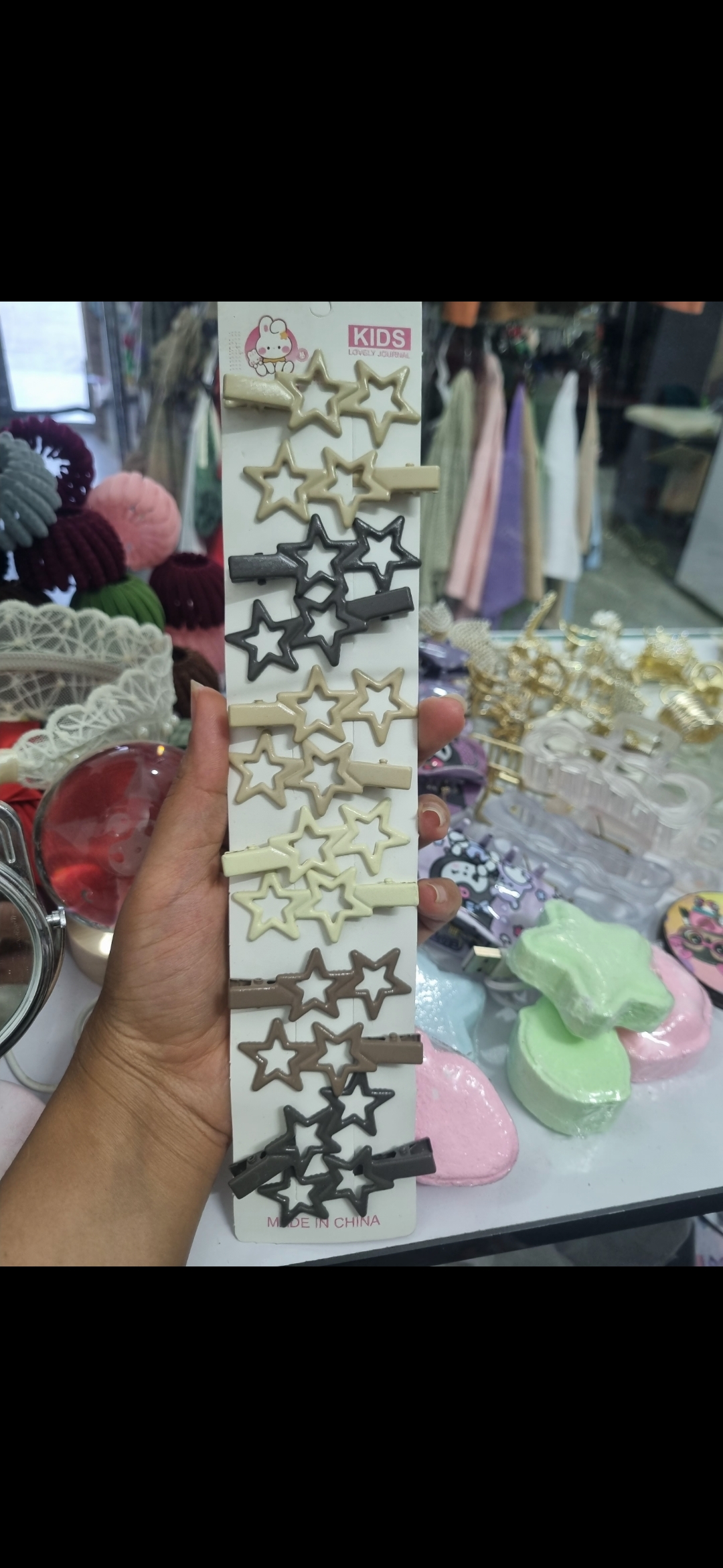 پک ۱۲عددی گیره انبری ستاره رنگ نود کرم قوه ای